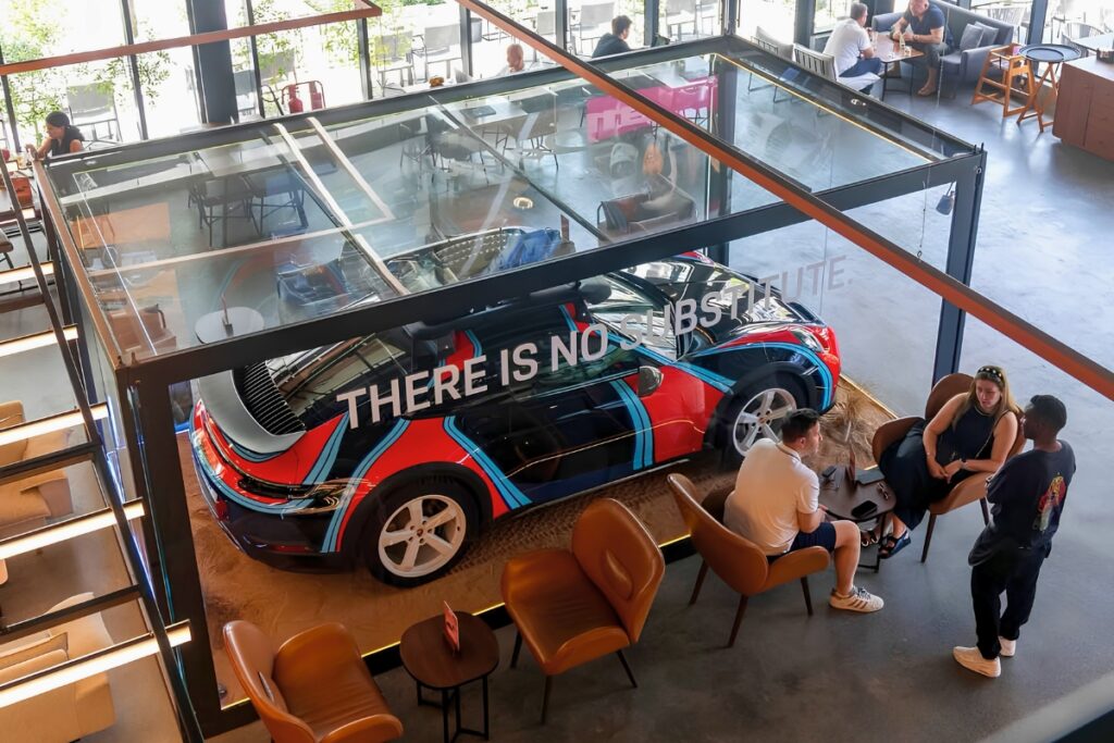 DRVN by Porsche concept café in Dubai with classic Porsche car displays and dining area