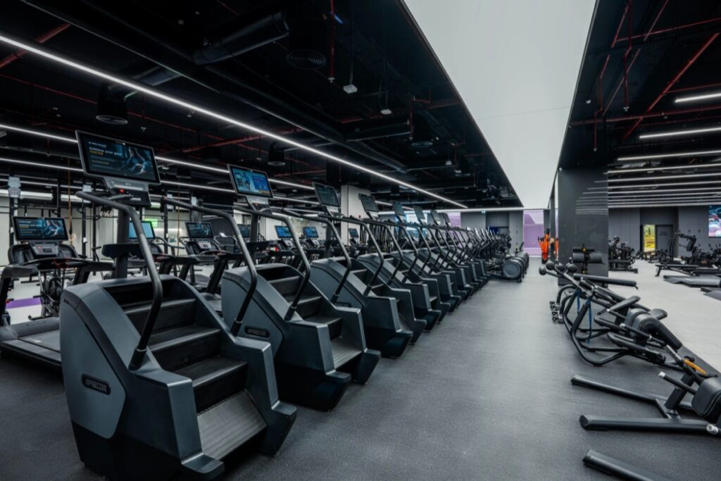 Indoor cycling class at CRANK fitness studio Dubai