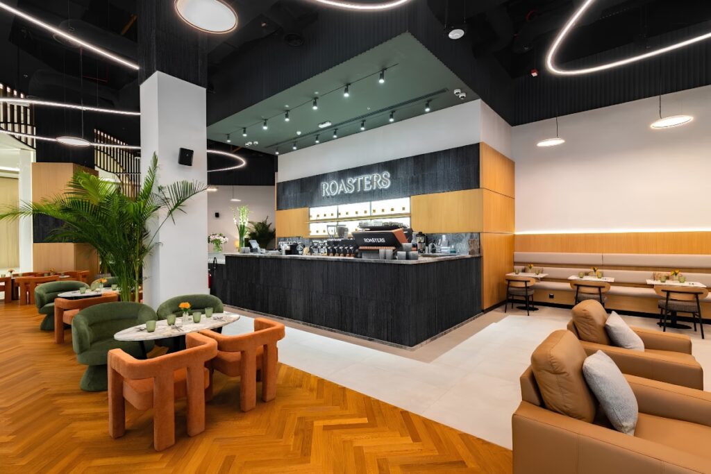 Roasters Speciality Coffee House rooftop overlooking Burj Khalifa