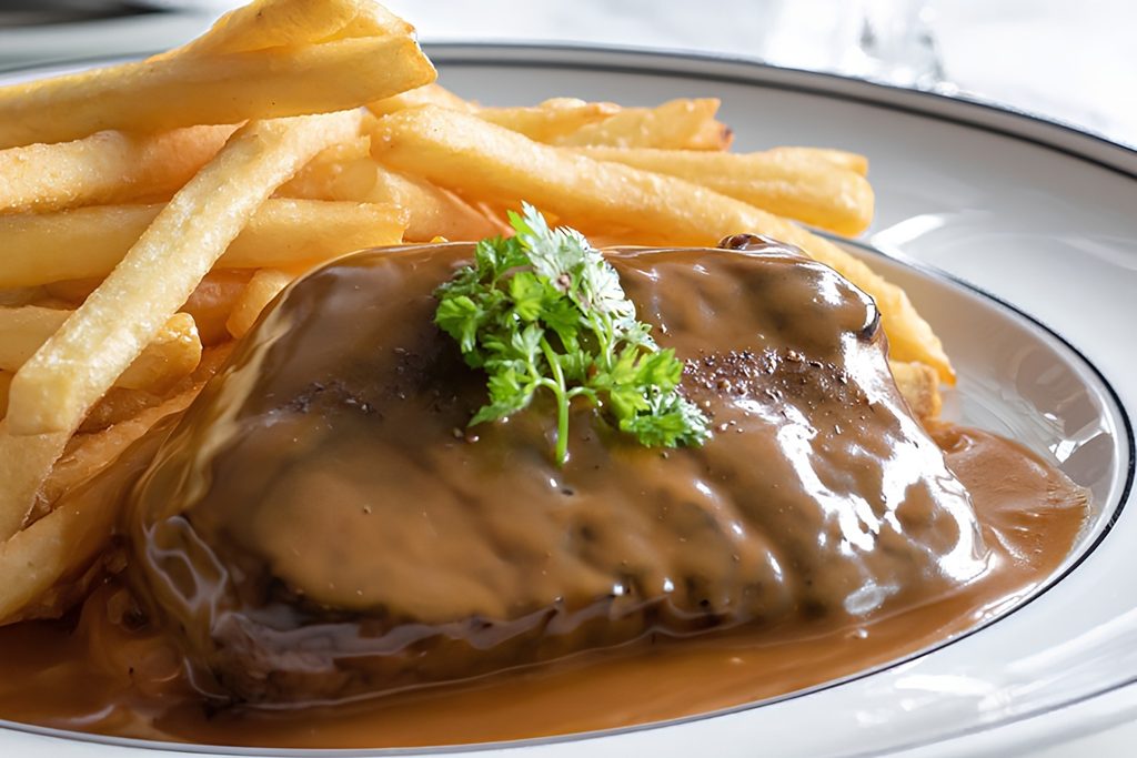French-style steak frites at Couqley French Brasserie Dubai