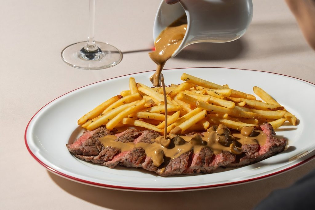 Steak frites served at Three Cuts steakhouse in Palm Jumeirah