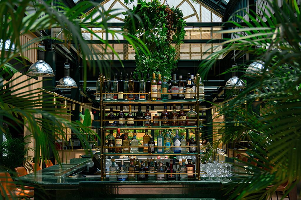 Eugène Eugène greenhouse-style indoor dining in Dubai