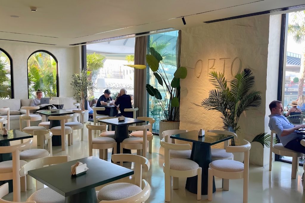 Orto Cafes for remote work in Dubai with comfortable seating and greenery